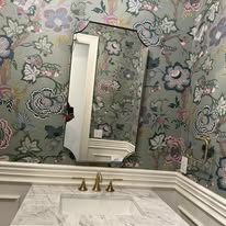 Bathroom vanity with floral accent wallpaper
