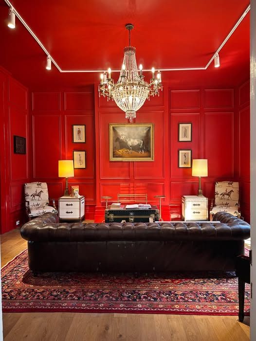 Custom red painted study with dark trim